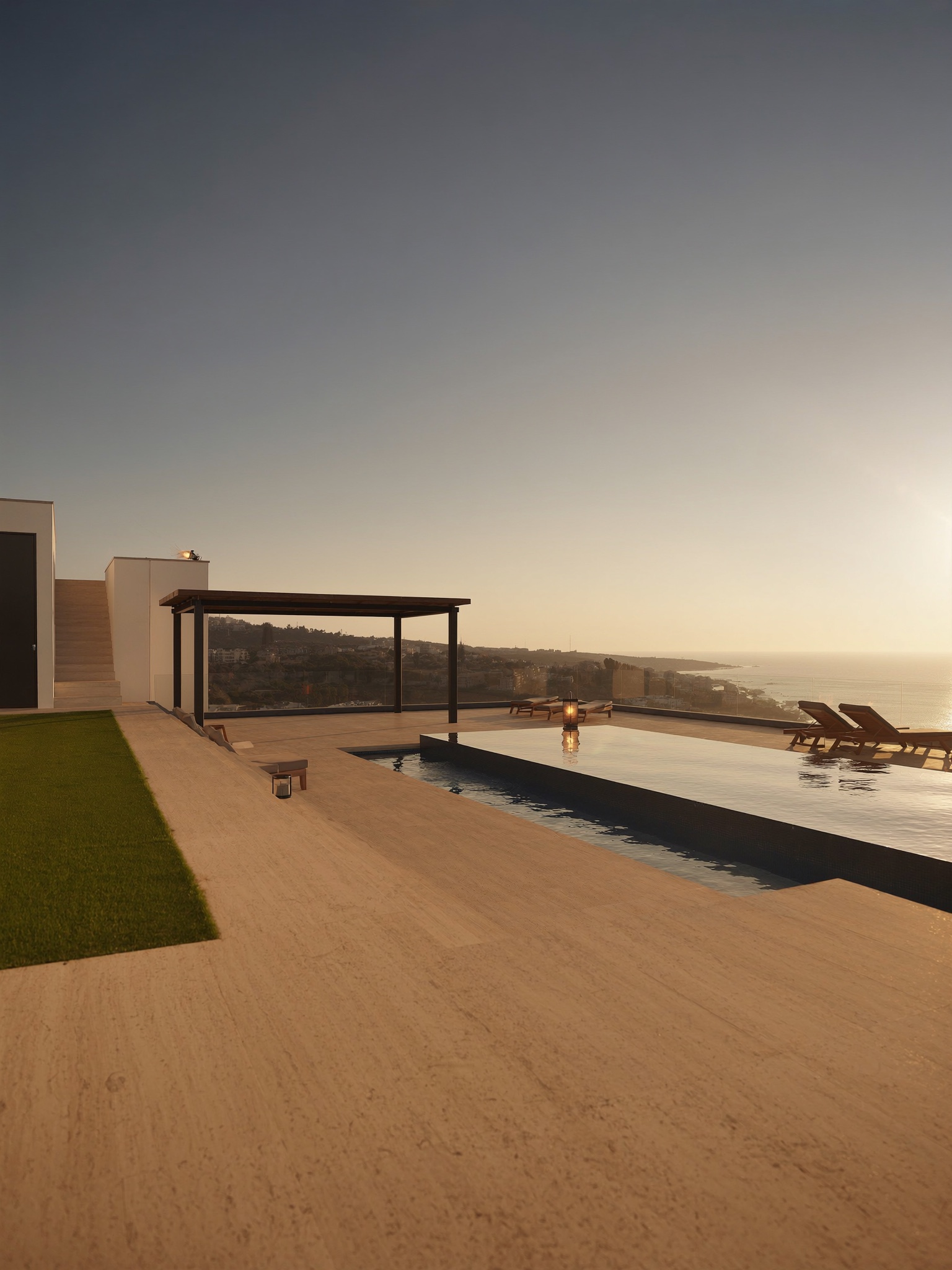 Penthouse-Dachterrasse mit Pool und Blick über die Küste
